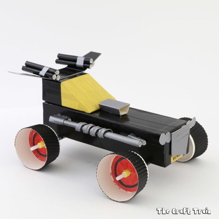 Make a Batmobile based on the Lego Batman movie using a repurposed cereal box and duct tape