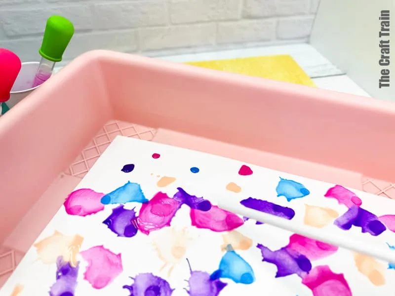 Straw Painting process art idea for kids. Blow paint across page using eye droppers and straws