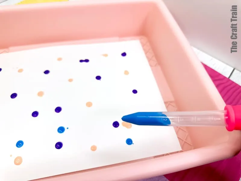 Straw Painting process art idea for kids. Blow paint across page using eye droppers and straws