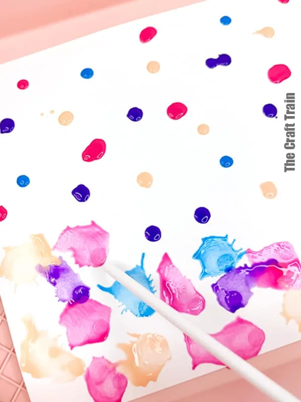 Straw Painting process art idea for kids. Blow paint across page using eye droppers and straws