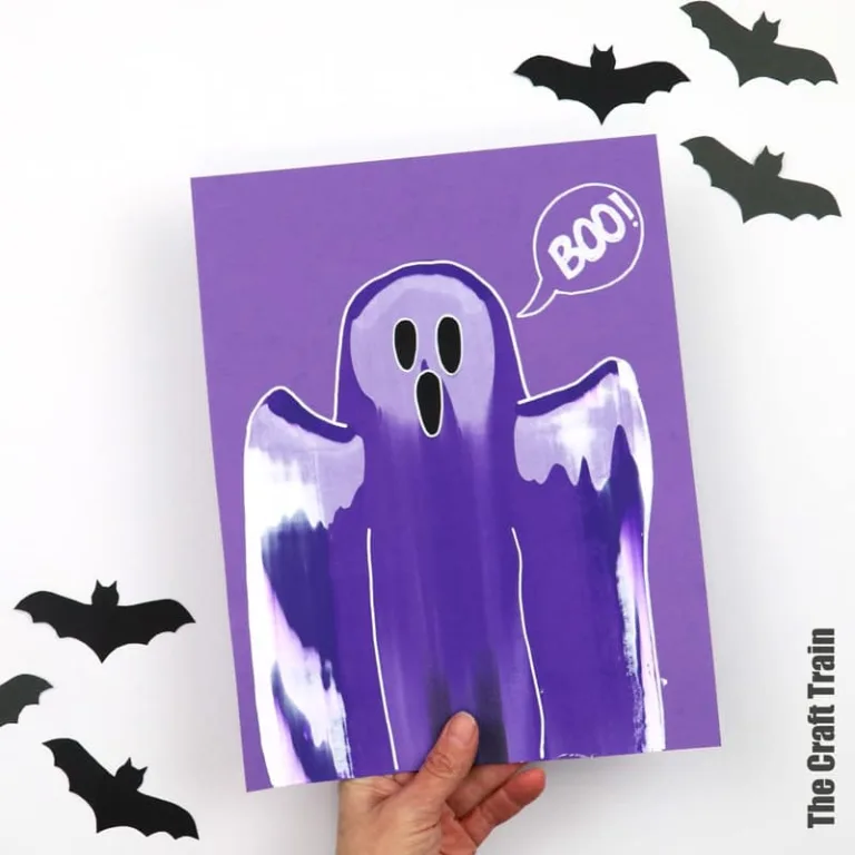 ghost scrape art squeegee painting for kids. This is a fun Halloween art idea