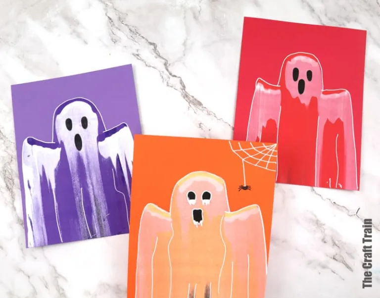 ghost scrape art squeegee painting for kids. This is a fun Halloween art idea
