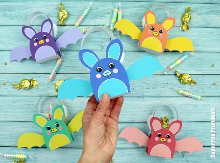 Printable rainbow bat baskets for Halloween treats. These are so colourful and fun!