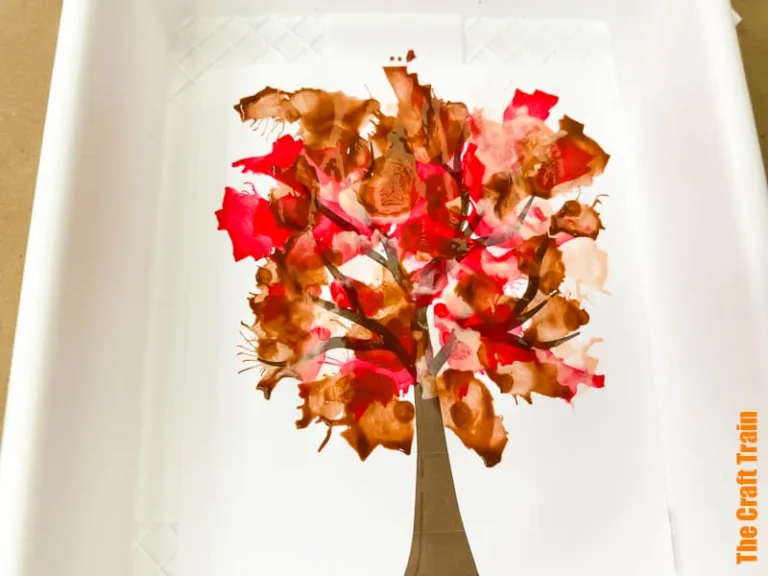 Fall tree blow art straw painting project for kids