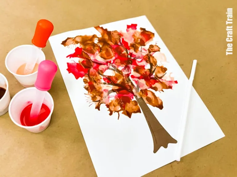 Fall tree blow art straw painting project for kids