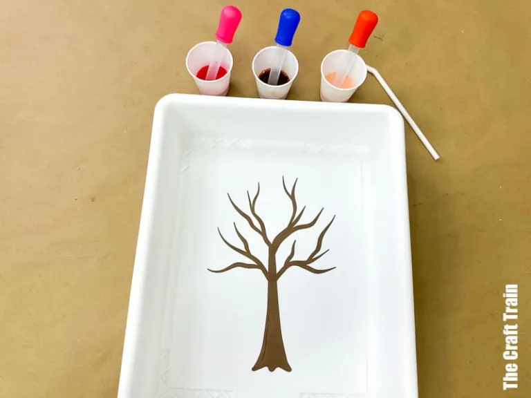 Fall tree blow art straw painting project for kids