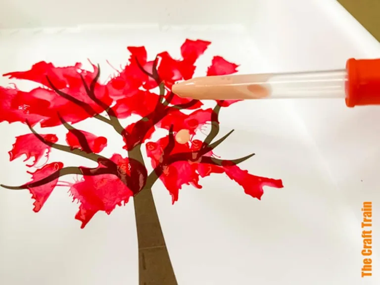 Fall tree blow art straw painting project for kids