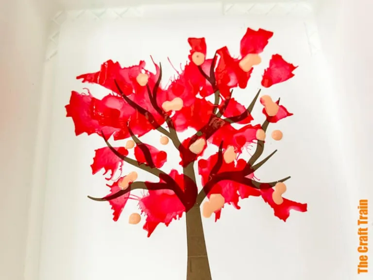 Fall tree blow art straw painting project for kids