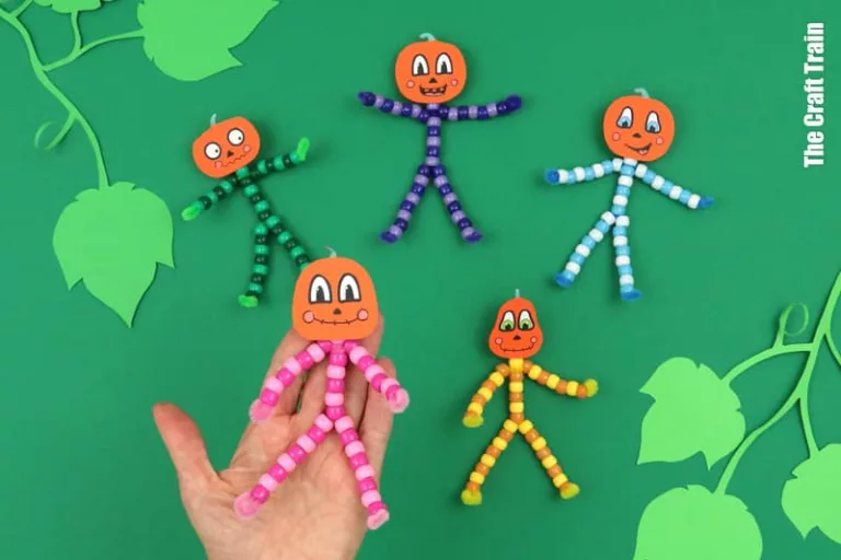 Mini pumpkin people beaded pipe cleaner characters kids can make
