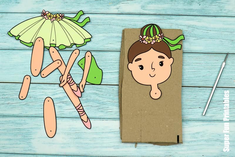 Paper ballerina doll steps
