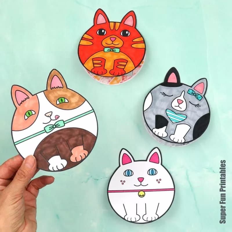 Rocking cat papercraft for kids. Make four cute cats that rock from side to side