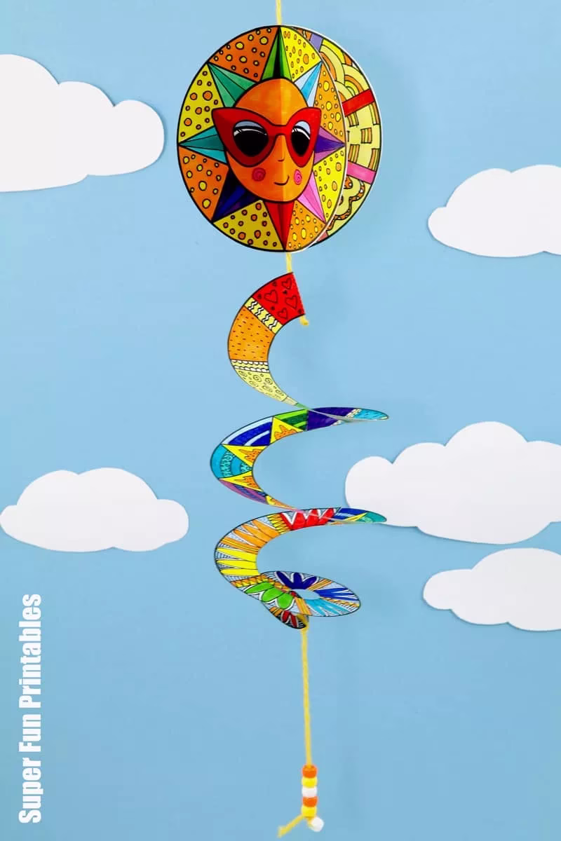 Sun Spinner paper craft for kids. Make a pattern art sun athat spins in the breeze