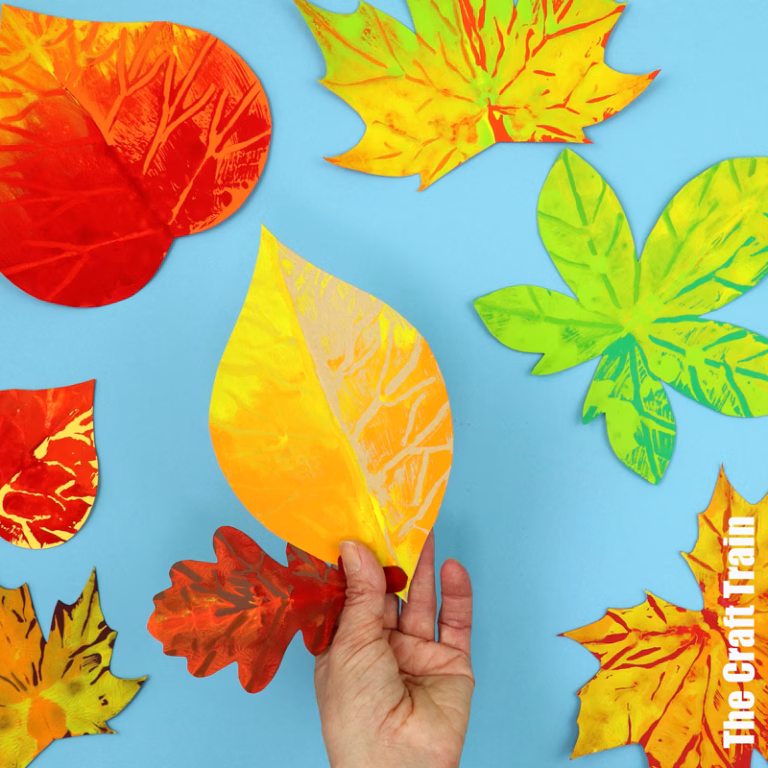 paper leaf squish art activity with printable template for Fall