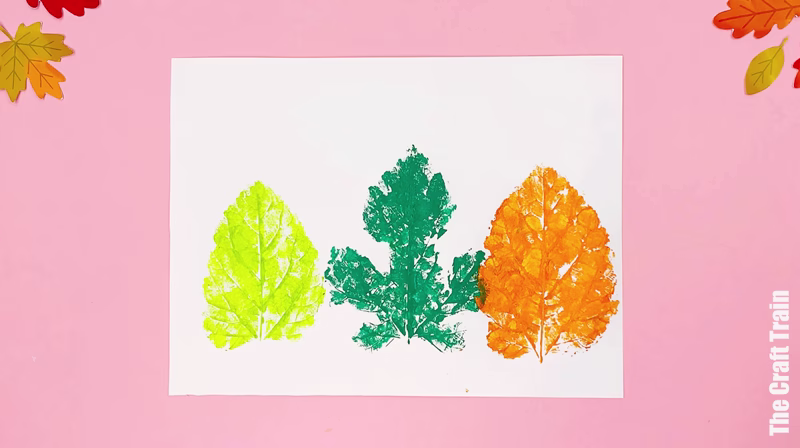 three leaf prints on a page, ready to be turned into monsters