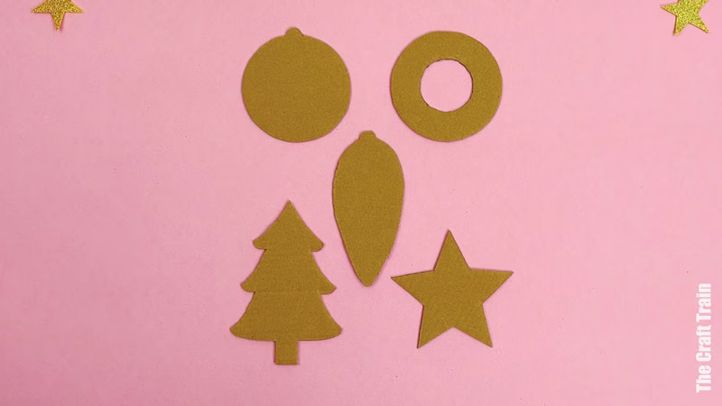 Steps to make cardboard shape decorations. Trace the shapes onto cardboard and cut them out.