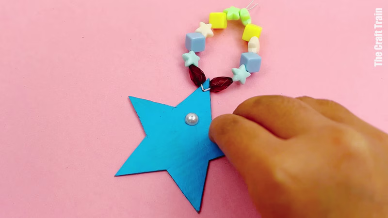 Steps to make cardboard shape decorations. Decorate your bauble with rhinestones and sequins