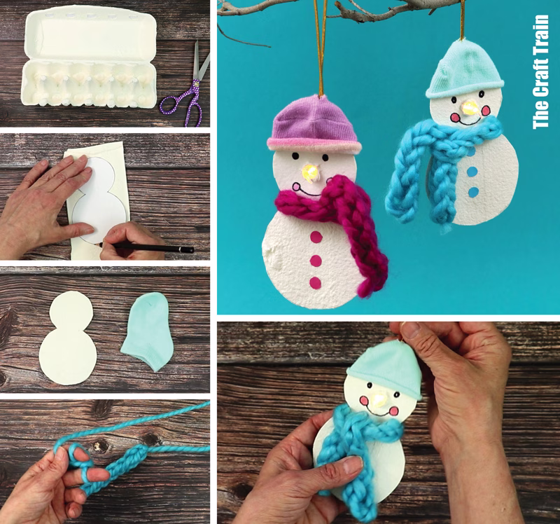 Egg carton snowman ornament suspended by a gold thread. The snowman is made from the lid of an egg carton with an LED candle for the nose