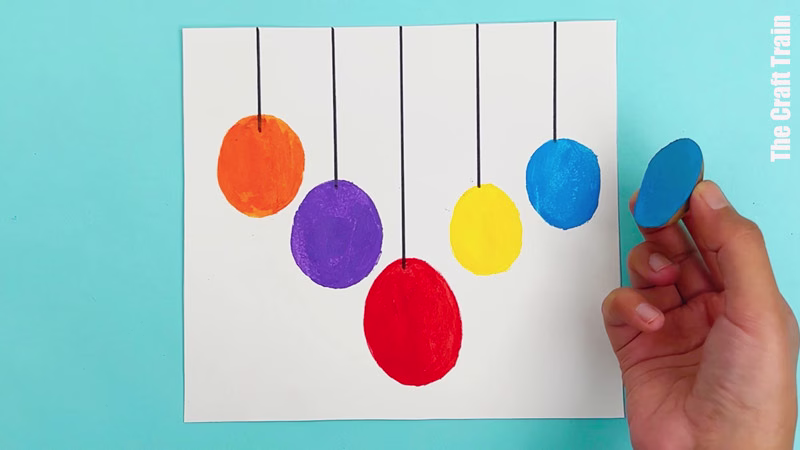 Potato stamp Christmas bauble artwork steps - stamp circles on the page