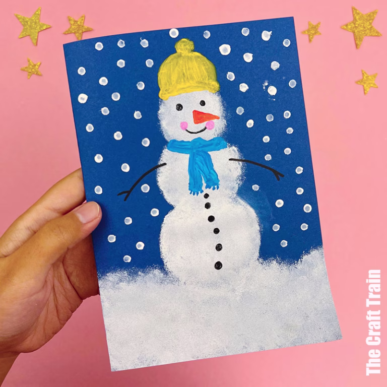Sponge painted snowman art activity for kids with Q-tip snow