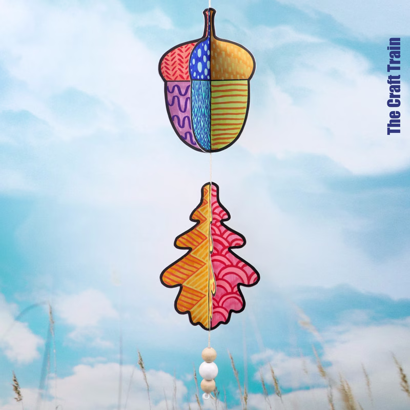 Acorn and leaf wind spinner paper decoration for Autumn or Fall, decorated with pattern art.